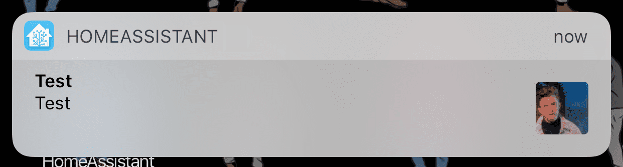 An unexpanded push notification with an attachment.